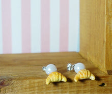 Load image into Gallery viewer, Dangling croissant earrings
